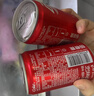 可口可乐（Coca-Cola）汽水 碳酸饮料 200ml*24罐  迷你摩登罐 新老包装随机发货 实拍图