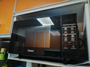 格兰仕（Galanz）变频微波炉烤箱一体机光波炉900瓦大功率速热家用23L大容量平板易清洁省电一级能效智能菜单烧烤 2026新升级彩膜BM1(S2) 实拍图