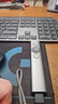罗技（Logitech）Spotlight 无线演投影笔 远程视频会议翻页笔 非激光笔 放大聚焦液晶屏可显（灰色） 实拍图