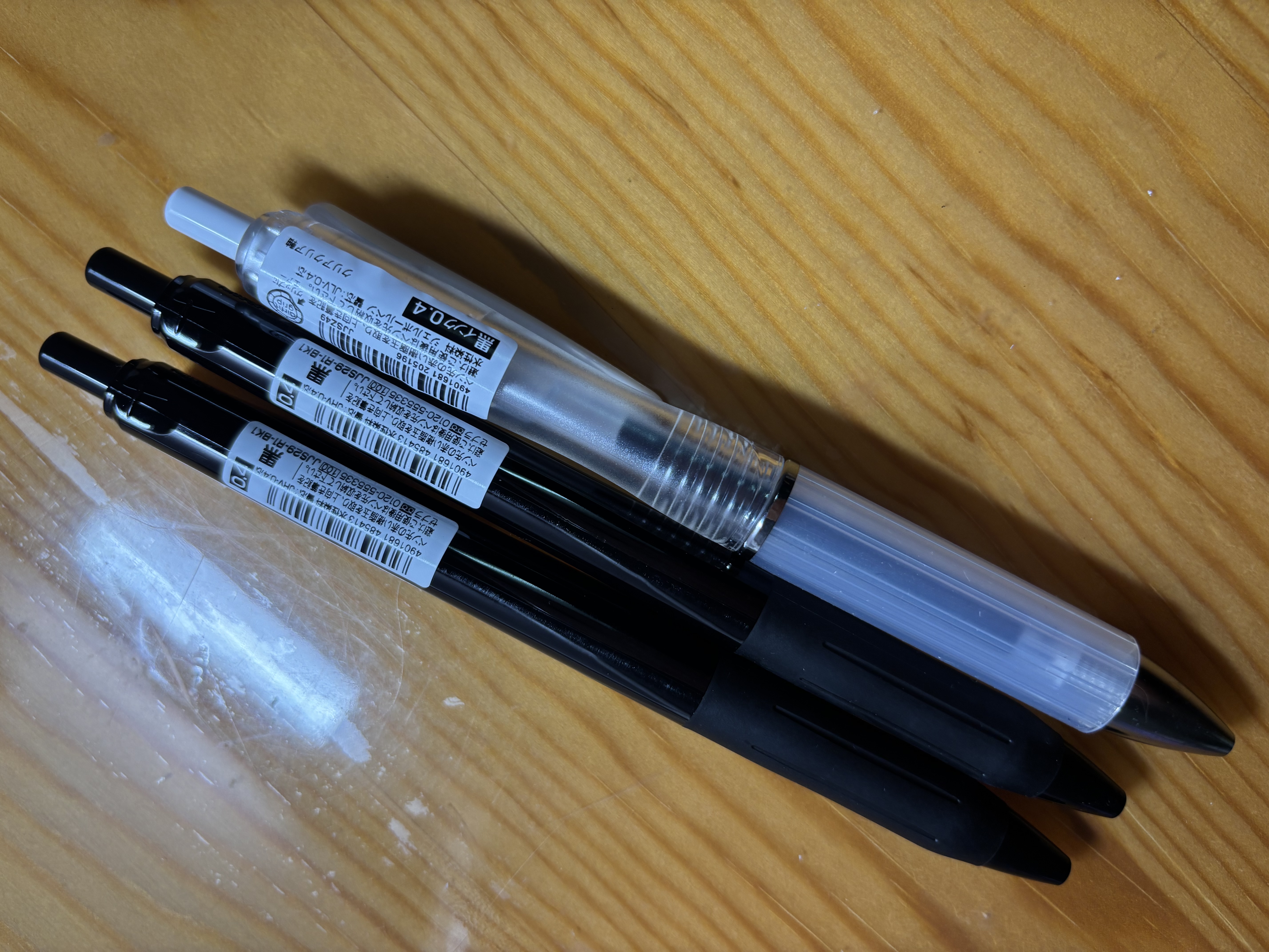 斑马牌（ZEBRA）0.4mm按动子弹头中性笔 彩色学生绘画签字笔标注填色手账笔水笔 JJS29-R1 黑杆黑芯 单支装 实拍图