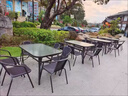 户外桌椅带伞套装阳台休闲庭院铁艺茶几家用室外露台奶茶店桌椅 150*90长方桌+8椅默发无孔 实拍图
