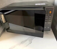 美的（Midea）家用变频微波炉平板式易清洁 800W微波速热 一键智能菜单 钻石背板 微晶面板加热20L（PM20M2） 实拍图