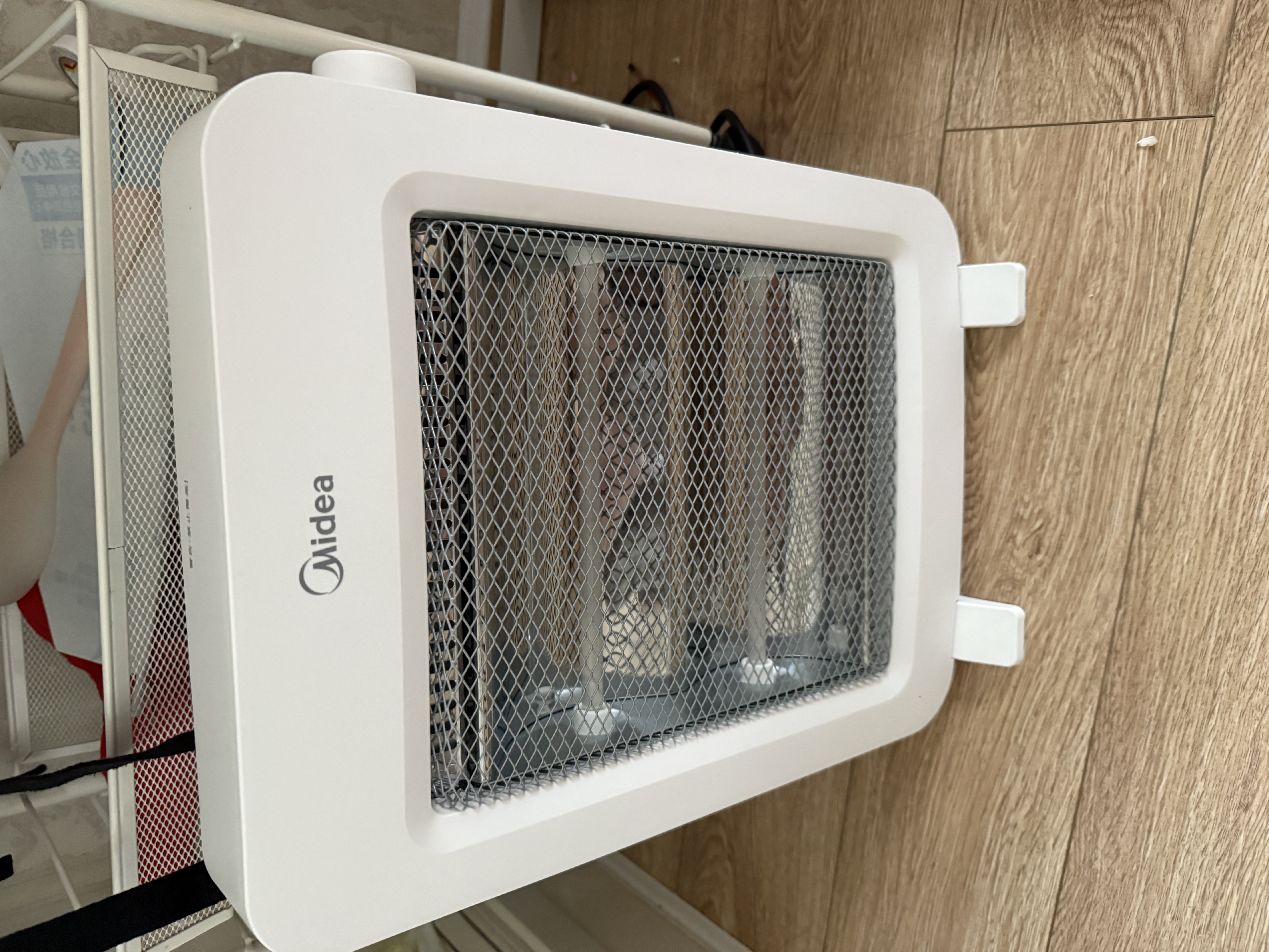 美的（Midea）【轻暖随行】家用取暖器/电暖器/电暖气/远红外/小太阳/取暖炉/迷你节能台式办公室烤火炉 NPS-MH 实拍图