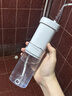 洁碧（Waterpik）冲牙器水牙线GS7-1便携式电动洁牙机手持式洗牙器家用立式预防牙结石正畸全身水洗 送母亲节礼物 GS7珍珠白【伸缩便携款】 10支喷头 实拍图