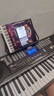 美科（Meirkergr）MK-975（智能版） 亮灯跟弹61键钢琴键多功能智能电子琴乐器 连接U盘手机pad带琴架 实拍图