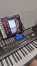 美科（Meirkergr）MK-975（智能版） 亮灯跟弹61键钢琴键多功能智能电子琴乐器 连接U盘手机pad带琴架 实拍图