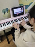 特伦斯电子琴88键成人儿童智能折叠钢琴X61A/V20手卷钢琴键盘乐器 V20樱花粉+专用琴包+Z型琴架 实拍图