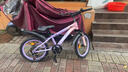 永久儿童自行车6-10-15岁以上中大童变速减震山地车单车赛车男女孩 辐条-维卡紫【减震 碟刹 99%装】 18寸7速【适合120-135cm】 实拍图