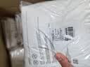 蕉趣（BANANA TRIP）一次性雨衣(全新料)成人户外连帽四排扣连体雨披白色10个装 实拍图