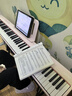 特伦斯电子琴88键成人儿童智能折叠钢琴X61A/V20手卷钢琴键盘乐器 V20樱花粉+专用琴包+Z型琴架 实拍图
