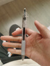 得力（deli）臻顺滑系列0.5mm子弹头中性笔 无印风签字笔水笔办公文具 黑色2支/卡 36012 实拍图