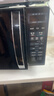 美的（Midea）微波炉烤箱一体机 小型家用20升微波炉  光波加热 钻石背板（M1-L201B） 实拍图