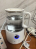 海尔恒温电热水壶1.5L 速热烧水壶煮茶壶冲泡奶粉调奶器 保温除氯不锈钢加热盘电热水壶H207白色 实拍图