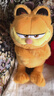 爱绒艺正版加菲猫大电影同款公仔毛绒玩具橘色Garfield胖猫咪玩偶礼物 30cm加菲猫家族-抱手加菲 正版授权 防伪镭射标 实拍图