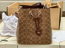蔻驰（COACH）奥莱女士夏季女包经典标志ROWAN水桶包单肩斜挎包通勤 IM/棕黄色/棕色 实拍图