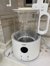 海尔恒温电热水壶1.5L 速热烧水壶煮茶壶冲泡奶粉调奶器 保温除氯不锈钢加热盘电热水壶H207白色 实拍图