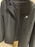 特步防泼水外套春夏新款男夹克上衣跑步服户外骑行服双层风衣运动服 0106常规-正黑色-经典简约 L 实拍图
