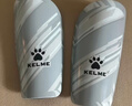 KELME/卡尔美成人足球护腿板 专业比赛训练护腿插板儿童护具K15S948 蓝色（新款-5001） S（适合身高135-160cm） 实拍图