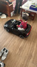 星辰皓奥迪儿童电动车四驱汽车遥控四轮宝宝玩具车可坐人童车RSGT 黑色+四驱+遥控+摇摆+皮座+软轮 实拍图