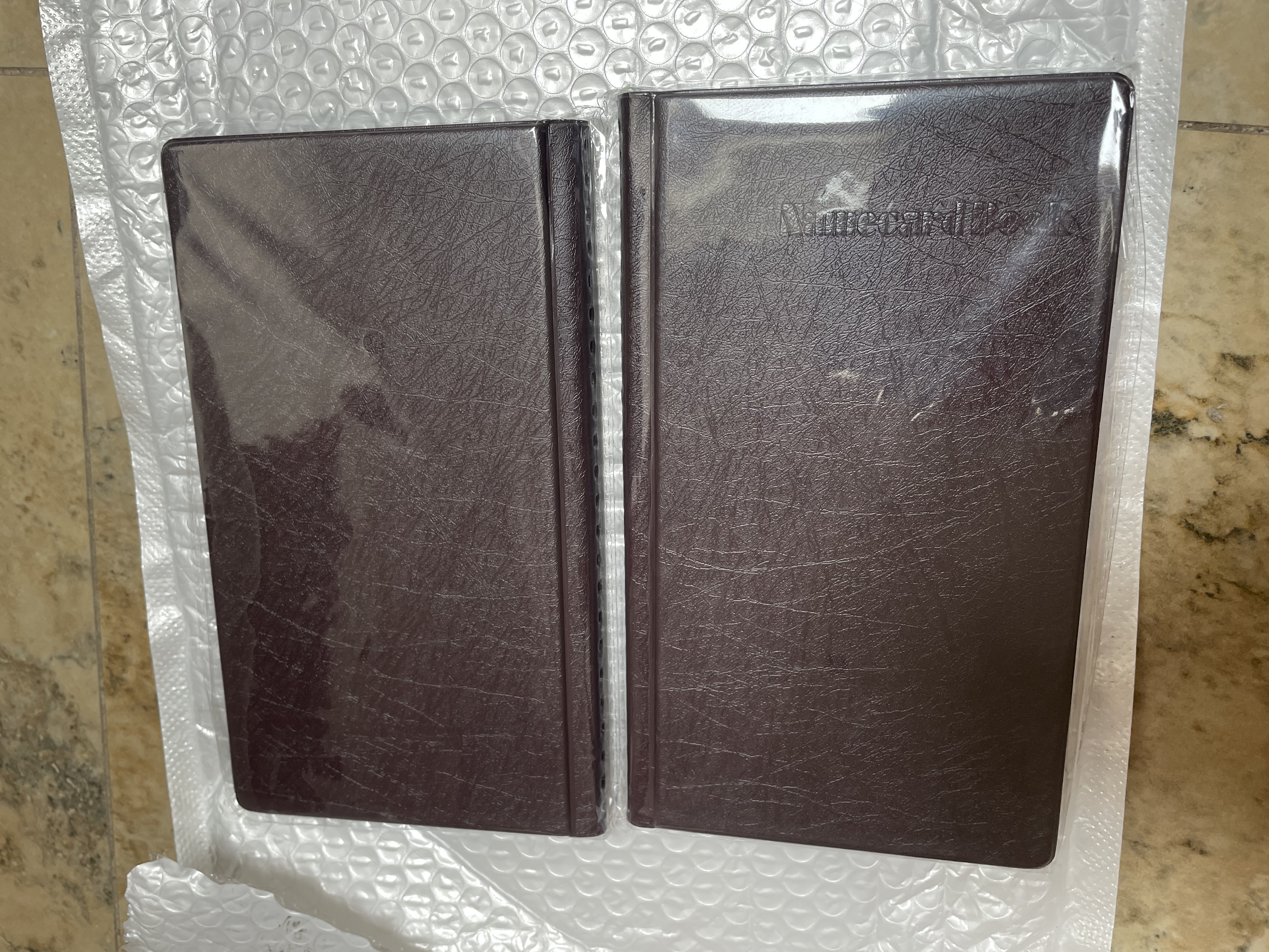 得力（deli）名片夹名片册大容量商务卡包证件包卡册火车票银行信用卡收纳男女名片办公用品 【棕色】可装180张名片 两本 实拍图