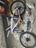 凤凰（Phoenix） 上海凤凰山地自行车成人男士女式学生变速宽胎越野赛车公路单车 铝架辐条轮紫【省力全轴承】 26寸27速【参考:158-188cm】 实拍图
