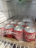 可口可乐（Coca-Cola）汽水 碳酸饮料 200ml*24罐  迷你摩登罐 新老包装随机发货 实拍图