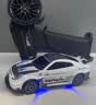 宏星模型（HONGXING MODEL）专业rc遥控车迷你漂移车911四驱汽车室内赛车GTR合金车暑假期礼物 GTR白色(全比例四驱+档位+金属车身+陀螺仪） 1个电池【续航25-30分钟】 实拍图