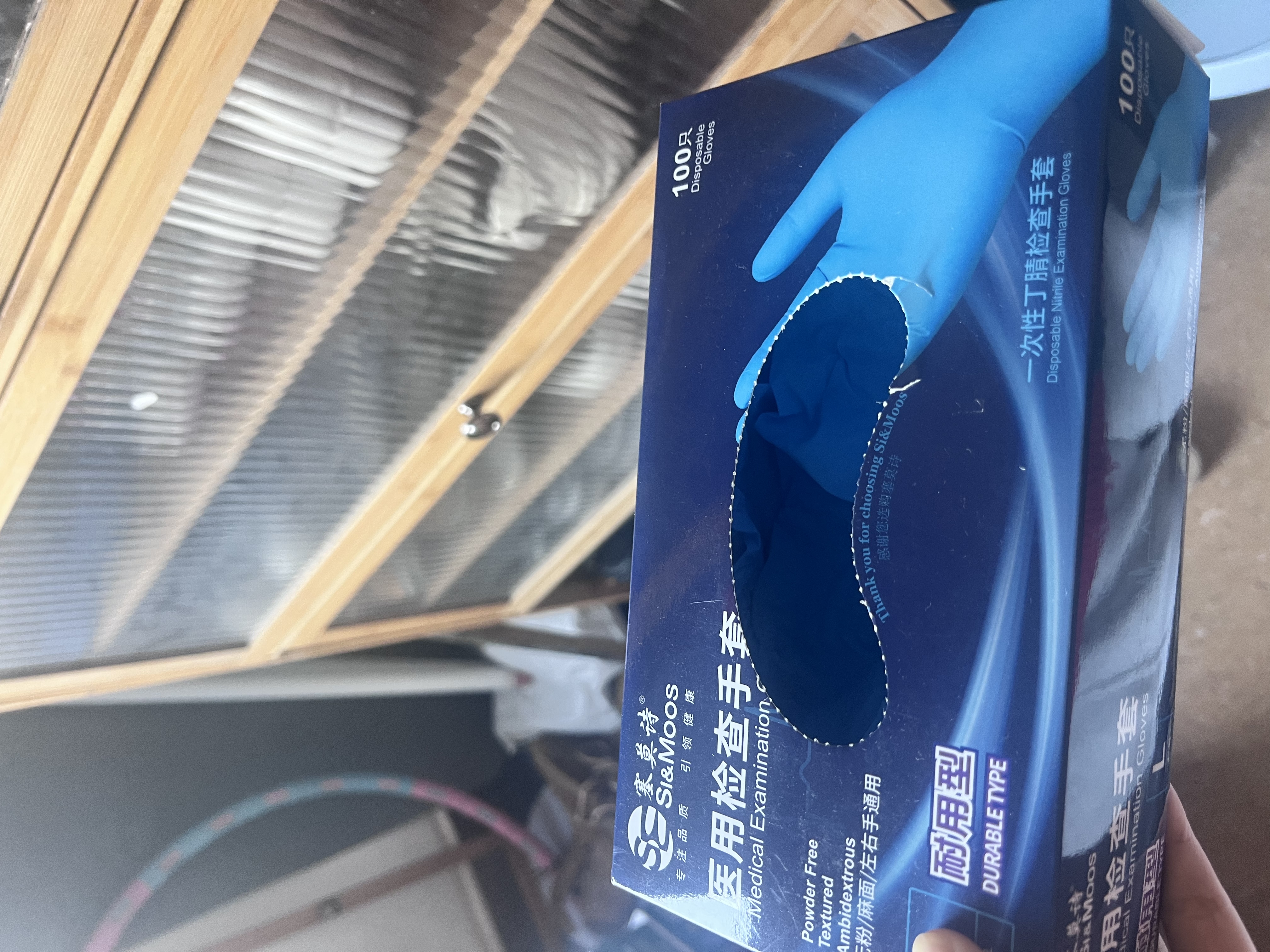 塞莫诗一次性丁腈手套加厚型 防水耐污 防水耐污100只 蓝色NM909BL 大号L码 实拍图