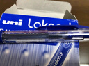 uni三菱 SN-100按动式圆珠笔 0.7mm圆珠笔 学生用笔 办公文具签字笔 蓝色 12支 实拍图