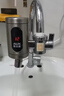 奥克斯（AUX）电热水龙头热水器免安装即热速热接驳款厨卫两用加热水龙头 【免安装】电镀银+漏保+送万向喷头 实拍图
