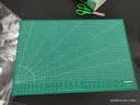 得力(deli)A3耐用PVC切割垫板桌垫/鼠标垫/书写垫 大号可水洗手工桌面刻板裁纸美工垫 绿色78401 实拍图