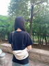回力斜挎包女2026新款大容量胸包男休闲轻便小包学生背包运动健身腰包 白色【太空人挂件】 实拍图