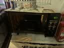 格兰仕（Galanz）变频微波炉烤箱一体机光波炉900瓦大功率速热家用23L大容量平板易清洁省电一级能效智能菜单烧烤 2026新升级彩膜BM1(S2) 实拍图