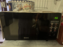 格兰仕（Galanz）变频微波炉烤箱一体机光波炉900瓦大功率速热家用23L大容量平板易清洁省电一级能效智能菜单烧烤 2026新升级彩膜BM1(S2) 实拍图