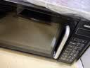 格兰仕（Galanz）微波炉烤箱一体机光波20L家用700W节能平板易清洁智能菜单多功能小型烧烤解冻预约DG 全新机器 实拍图