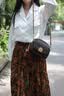 奥康（Aokang）斜挎包包女包精致小圆包单肩妈妈包百搭生日七夕情人节礼物送女友 咖啡色(小熊挂饰) 实拍图