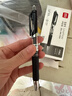 得力（deli）S01中性笔签字笔 0.5mm子弹头经典办公用品按动笔学生刷题笔水笔 黑色 12支/盒 实拍图