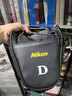 尼康Nikon 原装单反相机包D90D7200D7000D5600 D5500D7100便携相机包三角包 相机包含肩带 实拍图