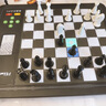 费米智能国际象棋AI人机下棋对战机器人学生儿童高档自动便携电子棋盘 L6pro黑色（中英文版）礼盒装 实拍图