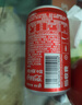 可口可乐（Coca-Cola）汽水 碳酸饮料 200ml*24罐  迷你摩登罐 新老包装随机发货 实拍图
