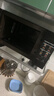 格兰仕（Galanz）变频微波炉烤箱一体机光波炉900瓦大功率速热家用23L大容量平板易清洁省电一级能效智能菜单烧烤 2026新升级彩膜BM1(S2) 实拍图