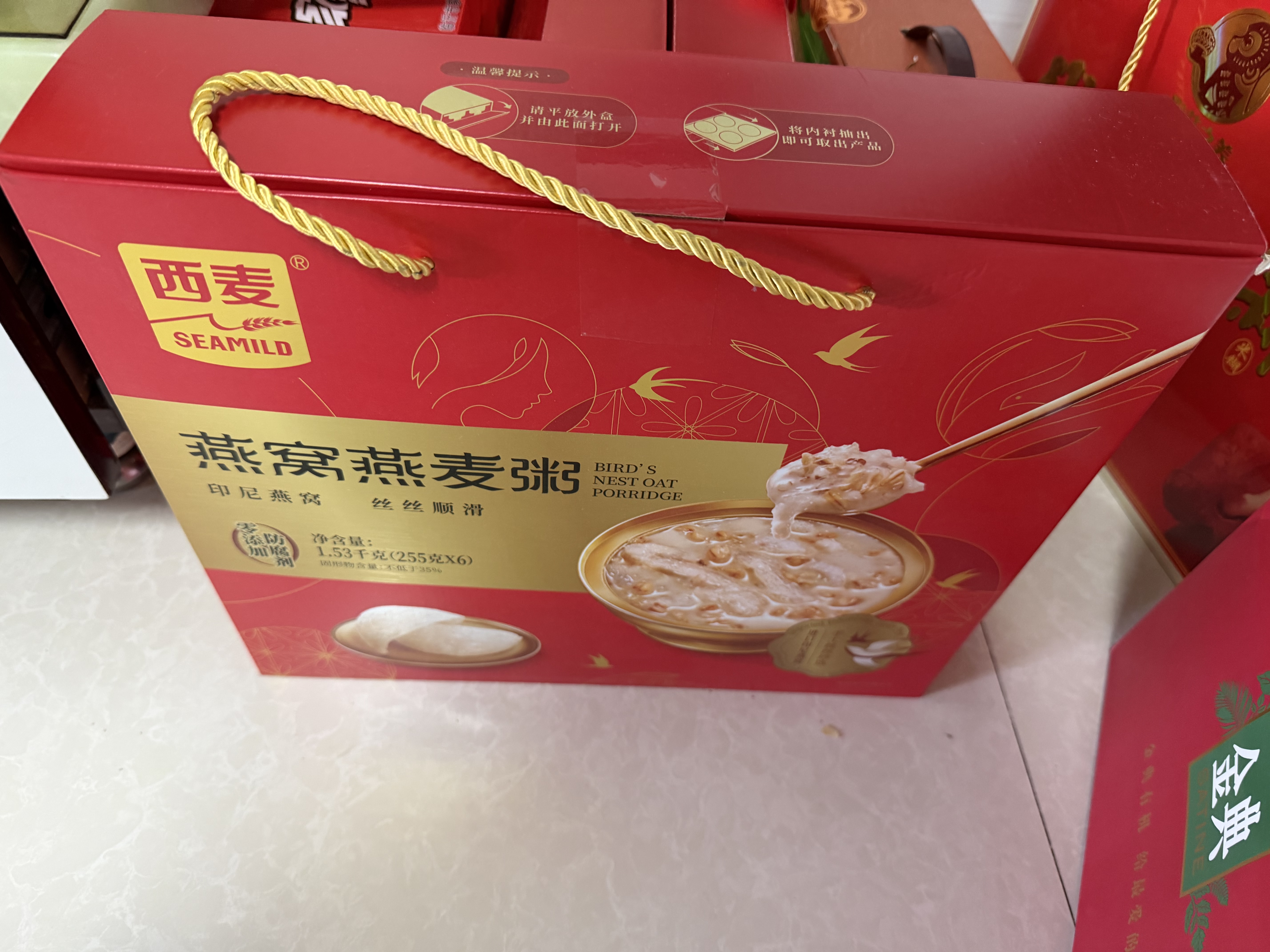 童泰（TONGTAI）婴儿连体衣秋冬季纯棉保暖宝宝衣服喜庆新年装蝴蝶哈衣红b52cm 实拍图