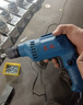 东成 J1Z-FF-10A（自锁）电钻 家用多功能手电钻 电动螺丝刀 300W 实拍图