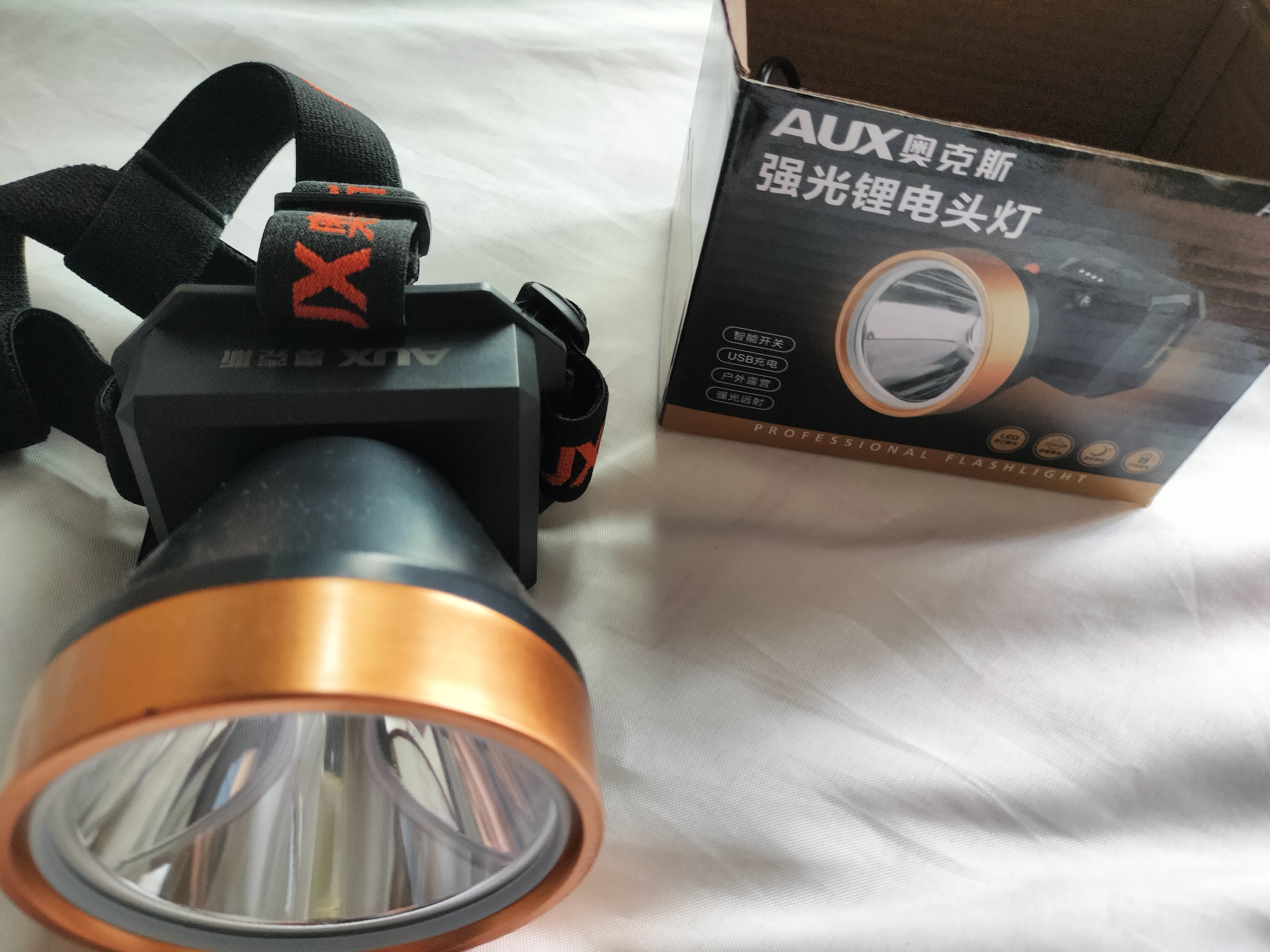 奥克斯头灯强光超长续航户外头戴式超亮头灯防赶海夜钓鱼手电筒 实拍图