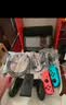 Nintendo Switch任天堂日版续航增强版红蓝手柄游戏主机 便携游戏掌机休闲家庭聚会 实拍图