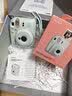 富士（FUJIFILM）instax  mini12 一次成像 立拍立得相机 mini12 薄荷绿 套餐四（官方标配+水晶壳+肩带+白边相纸10张） 实拍图