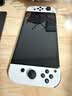任天堂（Nintendo）【国内保税仓】Switch2/1代 OLED/续航加强日版/港版便携家用ns体感游戏机掌机 日版OLED白色+马里奥奥德赛 实拍图
