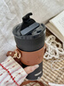 膳魔师（THERMOS）便携电动搅拌杯咖啡杯新款陶瓷涂层车载办公室保温杯高颜值水杯子 膳魔师-曜夜黑【395ml】+咖色杯套 实拍图