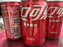 可口可乐（Coca-Cola）汽水 碳酸饮料 200ml*24罐  迷你摩登罐 新老包装随机发货 实拍图