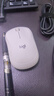 罗技（Logitech）M221 轻音鼠标 无线鼠标 办公鼠标 对称鼠标 带无线微型接收器 米白色 实拍图